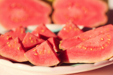 close up of red guava slices