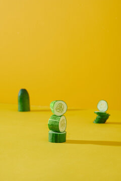 Cucumber isolated on the yellow background