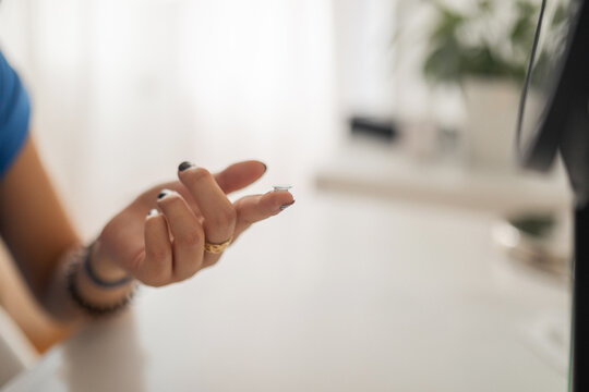 Contact Lens On The Finger Of A Teenage Girl