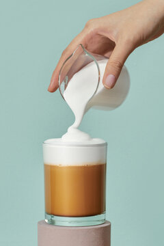 Preparation of coffee latte at home side view vertical