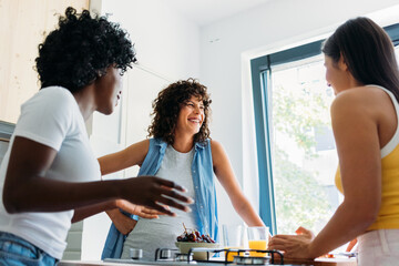 Women Hanging Out in Kitchen 