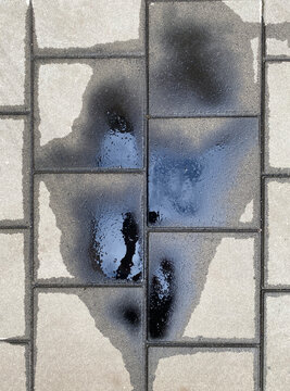 oil spill on pavement