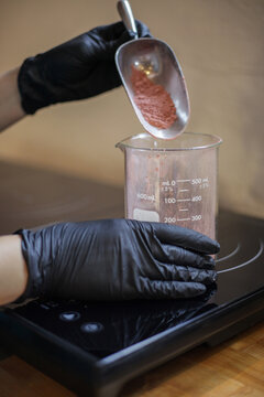 Measuring Flower Powder in Beaker