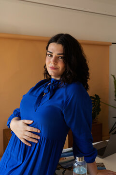 Trans woman at home office portrait
