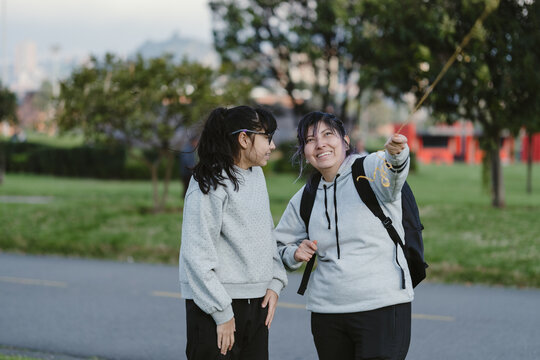 mother and daughter spending time together in the park