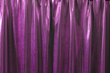 Shiny purple curtain with copy space.