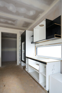 Kitchen cabinetry being assembled 