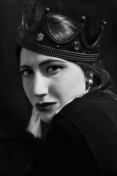 Gothic style woman portrait in black. Halloween black dark queen