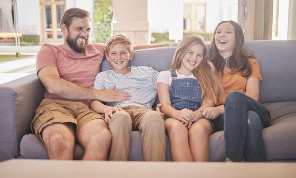 Happy, family and relax on a sofa with kids and parents laughing in a living room together, cheerful and content. Love, happy family and children share joke with mother and dad on couch in Australia