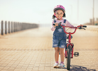 Black girl, learning and bike for portrait, smile or park path with sunshine, safety or happiness....