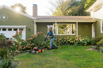 middle aged woman doing garden work