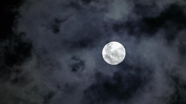 Full moon over the cloud