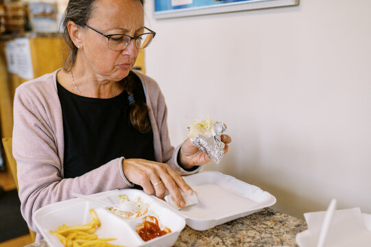 Woman eating take out