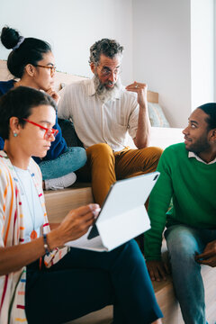 Group of colleagues having a meetup in creative co-working space