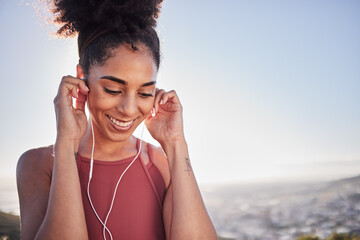 Radio, workout and woman in city for running, exercise and fitness training while listening to wellness audio track. Podcast, runner and black woman workout at sunrise, happy and excited by music