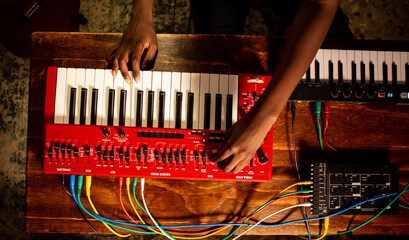 Overhead view of hands on a keyboard