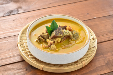Gulai or Gule Babat Jeroan Kambing Khas Solo. Goat or Lamb curry and offal, which is typical of Solo, uses a complete set of spices. The gravy is thick and savory with a spicy taste.