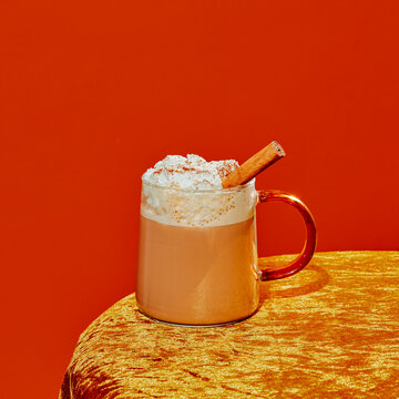 glass cup with a pumpkin spice latte