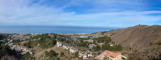 Scenic aerial panoramic view of Sharp Park residential neighborhood and Milagra Ridge in Pacifica, California from Pacifica Vista Point at Sharp Park Road.