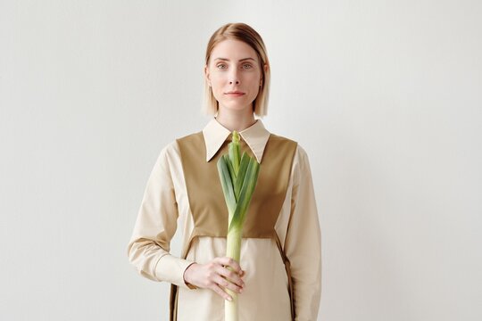 Caucasian Woman Holding Fresh Leek