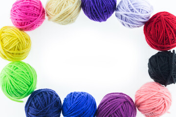 yarn many color top view on white background.