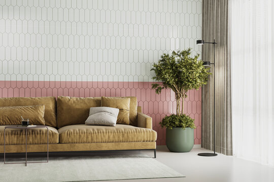 Beige sofa in room with pink and white tiled wall, modern interior