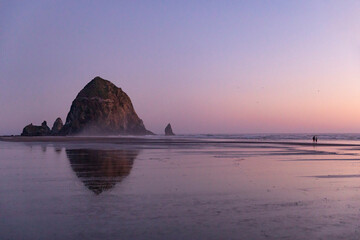 Cannon beach dusk sunset coast nature  landscape at low tide 