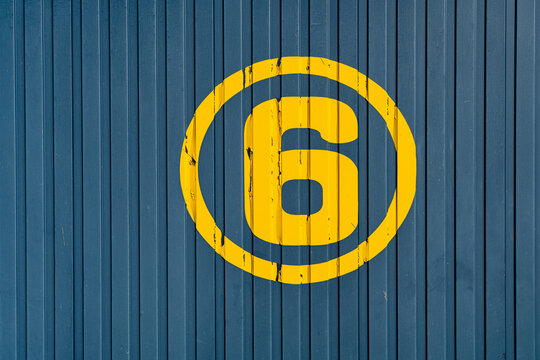 Circled Number Six On Wall