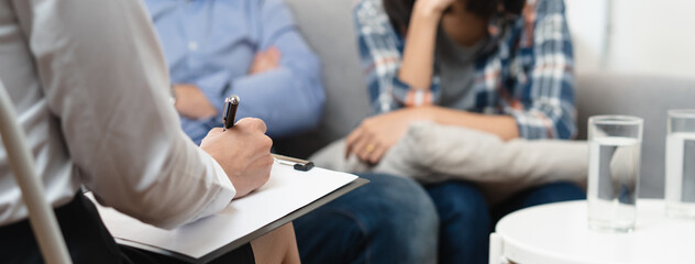 psychologist talking with married couple about depression of husband.