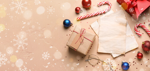 Empty paper sheets with gifts, eyeglasses and Christmas decorations on grunge background with space for text