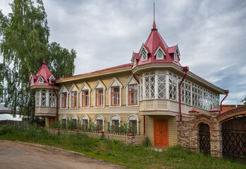 An old restored house with turrets in Votkinsk (Udmurtia, Russia) in summer.