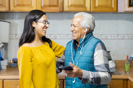 Portrait of grandfather with granddaughter enjoying time together
