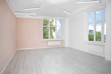 Fototapeta na wymiar New empty room with clean windows and light walls