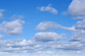 Obraz premium Picturesque blue sky with white clouds on sunny day