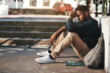 Education, fail and stress with a black man student worried about an exam or test on university campus. College, sad and scholarship with a male pupil feeling depressed after a negative report - obrazy, fototapety, plakaty