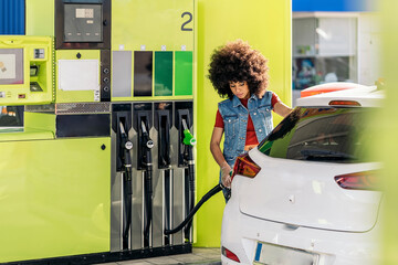 African Woman in Gas Station