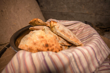 This is Bitschak - dumplings filled with spinach, baked in a clay oven. The taste is uniquely wonderful.