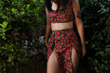 Pretty woman in blossom spring garden