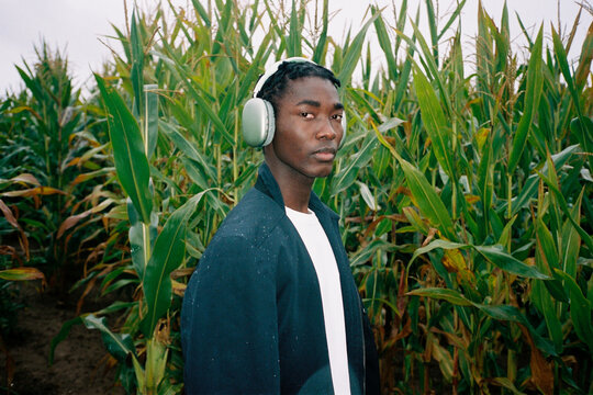 Film photo of a black man listening to music