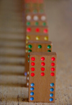 Row of Dominoes Set Up To Fall Down. Causaility Concept