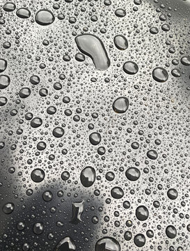  raindrops on black plastic