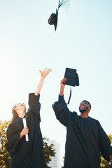 University, graduation and students with graduation cap in air for celebration, happiness and joy....