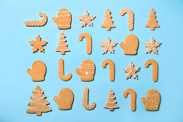 Set of tasty Christmas cookies on color background
