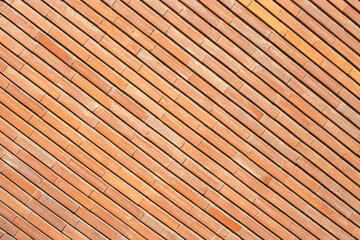 diagonals of a red brick wall, stylish city backdrop for fashion