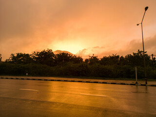 The Mountain Forest on Background of Sunset. Dramatic Sunset Sky