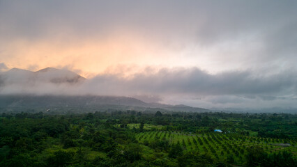 Naklejka premium Mountain and road with Sunrise in localside