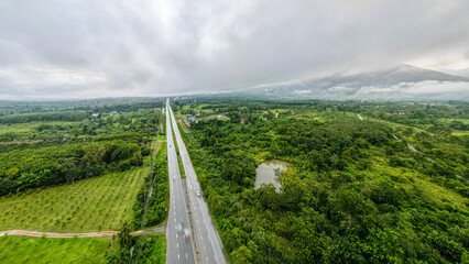 Mountain and road with Sunrise in localside