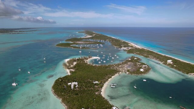 The drone aerial footage of Stocking Island, Exuma, Bahamas. Exuma is a district of The Bahamas, consisting of over 365 islands, also called cays.  
