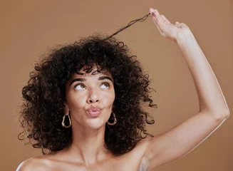 Vlies Fototapete Schönheitssalon Hair care, black woman and hairstyle health texture of a model holding afro to show salon results. Beauty, skincare and natural skin glow of a young woman think about cosmetic wellness and hair style