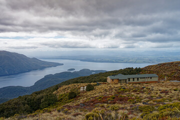 Fototapeta na wymiar Mount Luxmore hut overlooking Lake Te Anau from the Kepler Track.